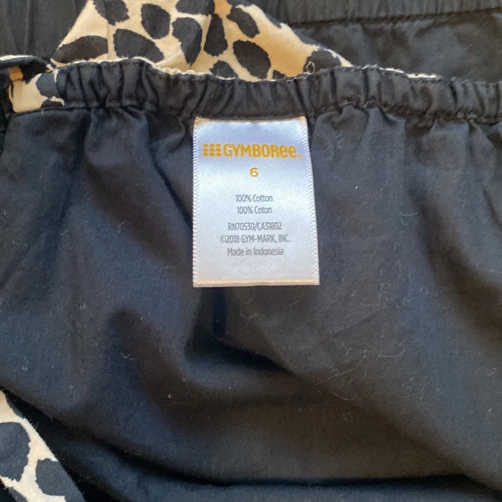 GYMBOREE Asymmetrical Black romper with cheetah ruffle